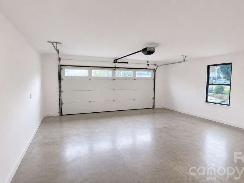 140 Main Street, Mars Hill, NC 28754.  MLS# CAR4375742, YatesRealty ID 18974. Two car garage.