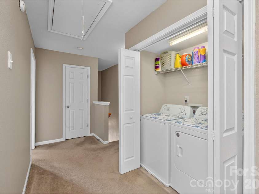 3066 Priory Ridge Drive, Fort Mill, SC 29707.  MLS# CAR4349645, YatesRealty ID 18977. Hallway and Laundry Closet