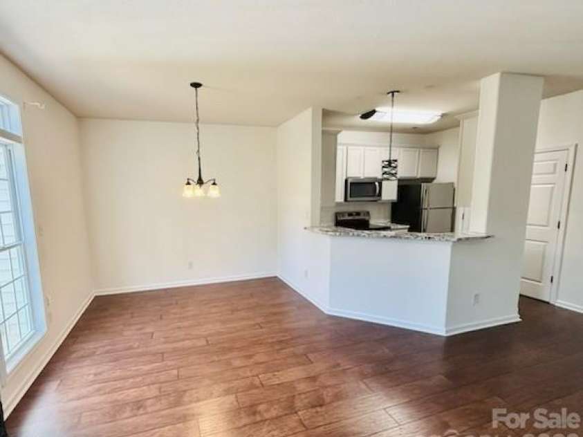 3066 Priory Ridge Drive, Fort Mill, SC 29707.  MLS# CAR4349645, YatesRealty ID 18977. Living Room/Dining Room Refreshed 