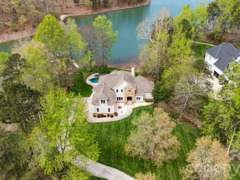 141 Grand Bay Drive, Mooresville, NC 28117.  MLS# CAR4364681, YatesRealty ID 18978. Experience private waterfront enjoyment