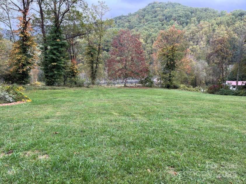 8020 Meadow Fork Road, Hot Springs, NC 28743.  MLS# CAR4306581, YatesRealty ID 1898. Field below Main Lodge