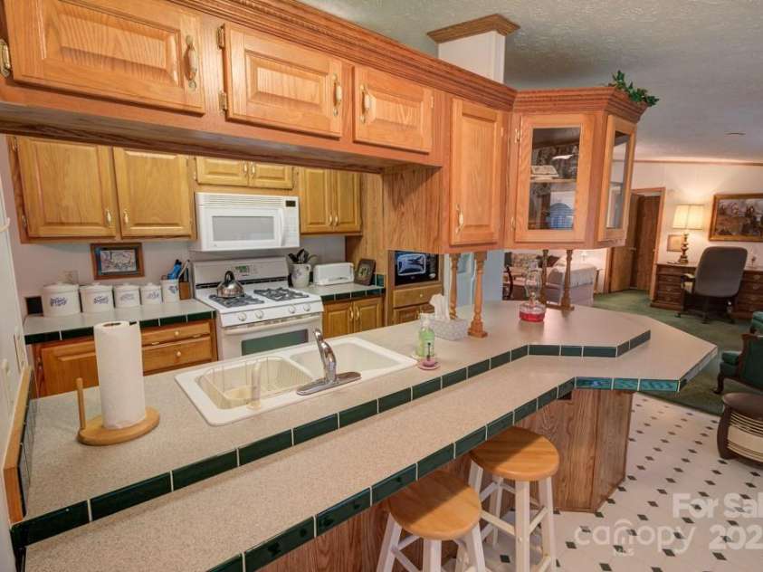 8020 Meadow Fork Road, Hot Springs, NC 28743.  MLS# CAR4306581, YatesRealty ID 1898. Guest House kitchen