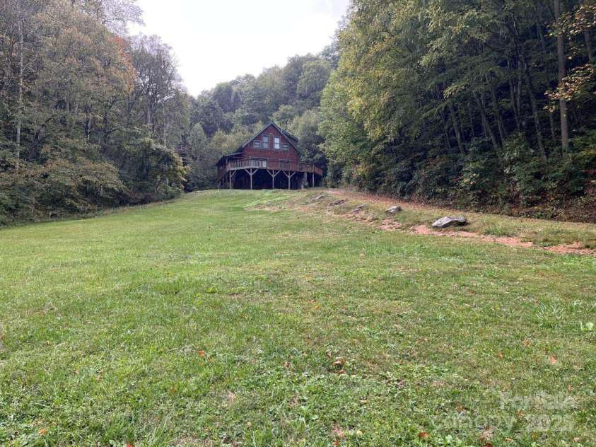 8020 Meadow Fork Road, Hot Springs, NC 28743.  MLS# CAR4306581, YatesRealty ID 1898. Main lodge from below
