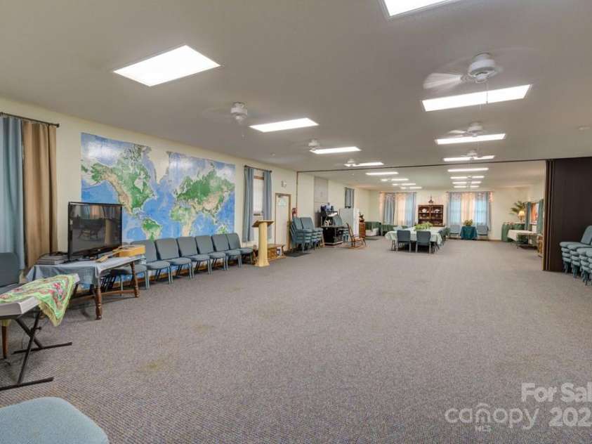8020 Meadow Fork Road, Hot Springs, NC 28743.  MLS# CAR4306581, YatesRealty ID 1898. Multipurpose building meeting room