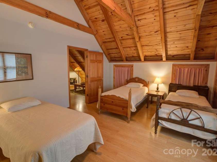 8020 Meadow Fork Road, Hot Springs, NC 28743.  MLS# CAR4306581, YatesRealty ID 1898. Second bedroom upstairs in Main Lodge
