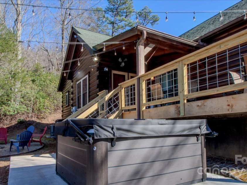 187 Gardeners Cove Road, Whittier, NC 28789.  MLS# CAR4231313, YatesRealty ID 18982. Rear Deck and Hot Tub