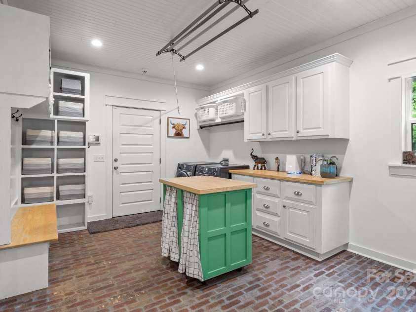 213 Genesis Place, Cleveland, NC 27013.  MLS# CAR4262619, YatesRealty ID 18984. Mudroom with laundry and pantry. Leads out to the garage.