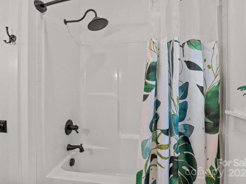 213 Genesis Place, Cleveland, NC 27013.  MLS# CAR4262619, YatesRealty ID 18984. Secondary bathroom tub + shower combo