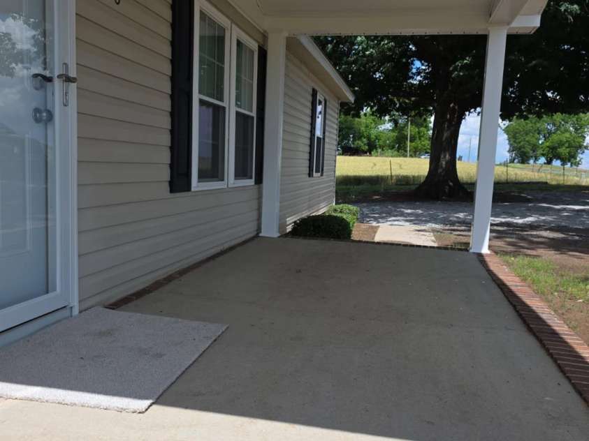 6006 White Store Road, Marshville, NC 28103.  MLS# CAR4256474, YatesRealty ID 18986. Front covered porch