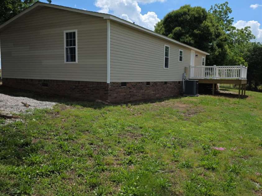 6006 White Store Road, Marshville, NC 28103.  MLS# CAR4256474, YatesRealty ID 18986. Side/rear view