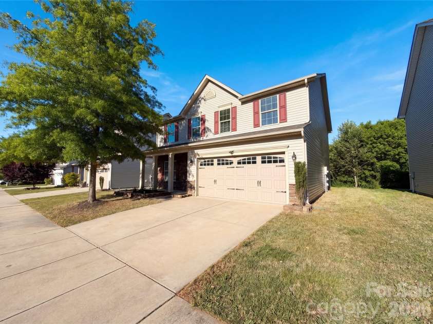 1303 Farm Branch Drive, Concord, NC 28027.  MLS# CAR4402107, YatesRealty ID 18987. Front of home