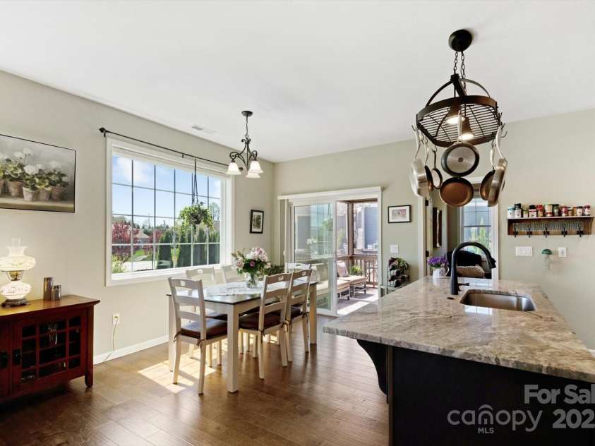 423 Blacksmith Run Drive, Hendersonville, NC 28792.  MLS# CAR4245571, YatesRealty ID 18989. Dining area as part of open floor plan.