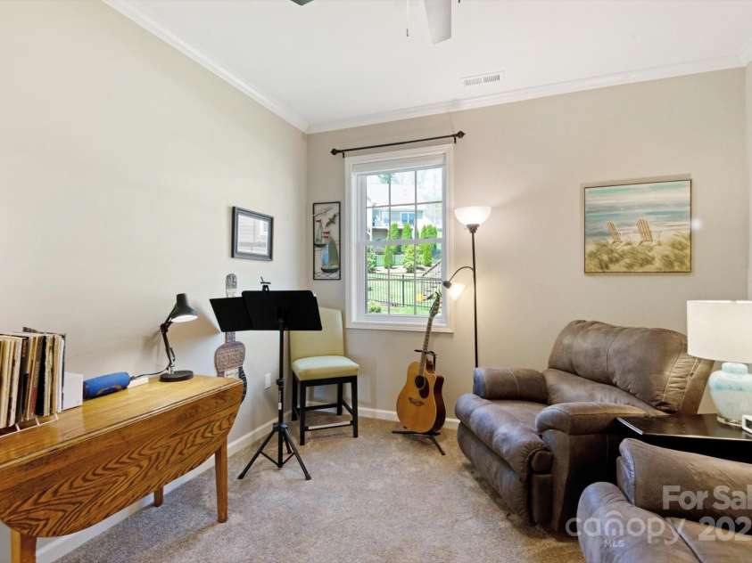 423 Blacksmith Run Drive, Hendersonville, NC 28792.  MLS# CAR4245571, YatesRealty ID 18989. Secondary bedroom currently used as a small den.