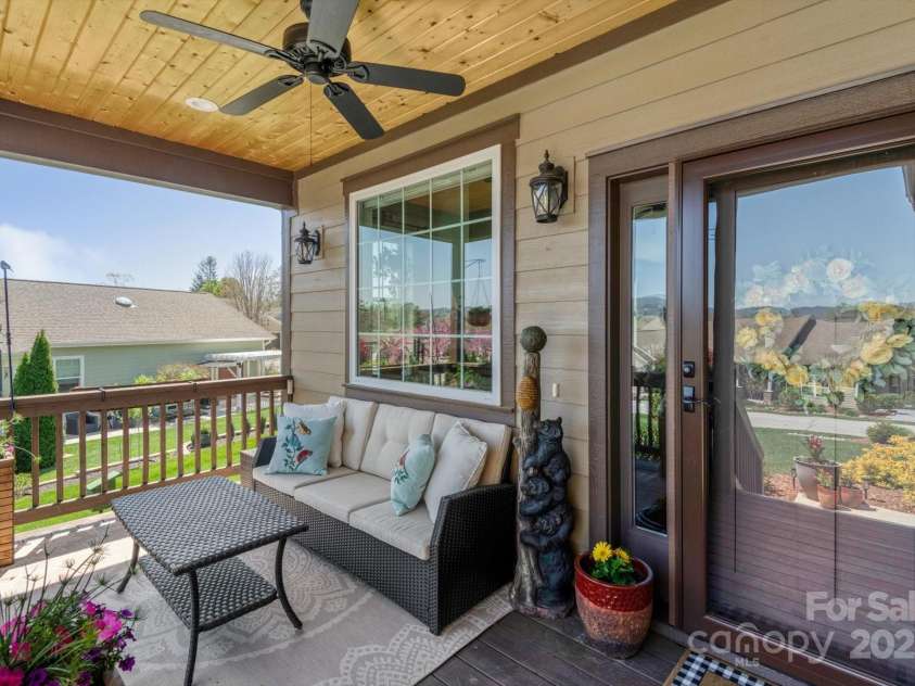 423 Blacksmith Run Drive, Hendersonville, NC 28792.  MLS# CAR4245571, YatesRealty ID 18989. Sliding doors make the indoor/outdoor transition seamless.