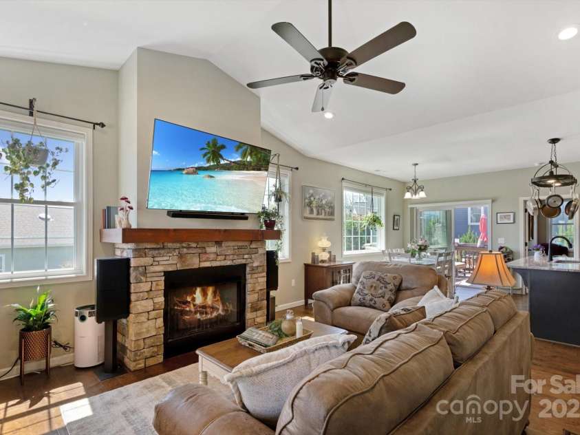 423 Blacksmith Run Drive, Hendersonville, NC 28792.  MLS# CAR4245571, YatesRealty ID 18989. Stone fireplace.