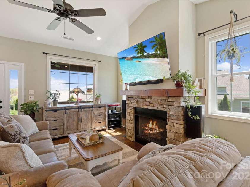 423 Blacksmith Run Drive, Hendersonville, NC 28792.  MLS# CAR4245571, YatesRealty ID 18989. Vaulted ceilings in living room.