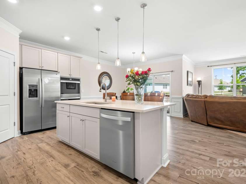 5058 Antebellum Drive, Iron Station, NC 28080.  MLS# CAR4260729, YatesRealty ID 18996. Beautiful light and airy kitchen