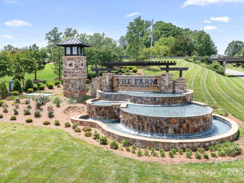 5058 Antebellum Drive, Iron Station, NC 28080.  MLS# CAR4260729, YatesRealty ID 18996. Entrance Fountain