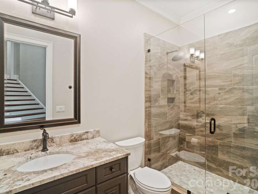 9105 Island Point Road, Charlotte, NC 28278.  MLS# CAR4329226, YatesRealty ID 19009. Full Bath (easily accessible from gym and pool)