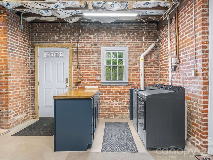 9 Crescent Drive, Marion, NC 28752.  MLS# CAR4370205, YatesRealty ID 19010. Abundant Laundry space