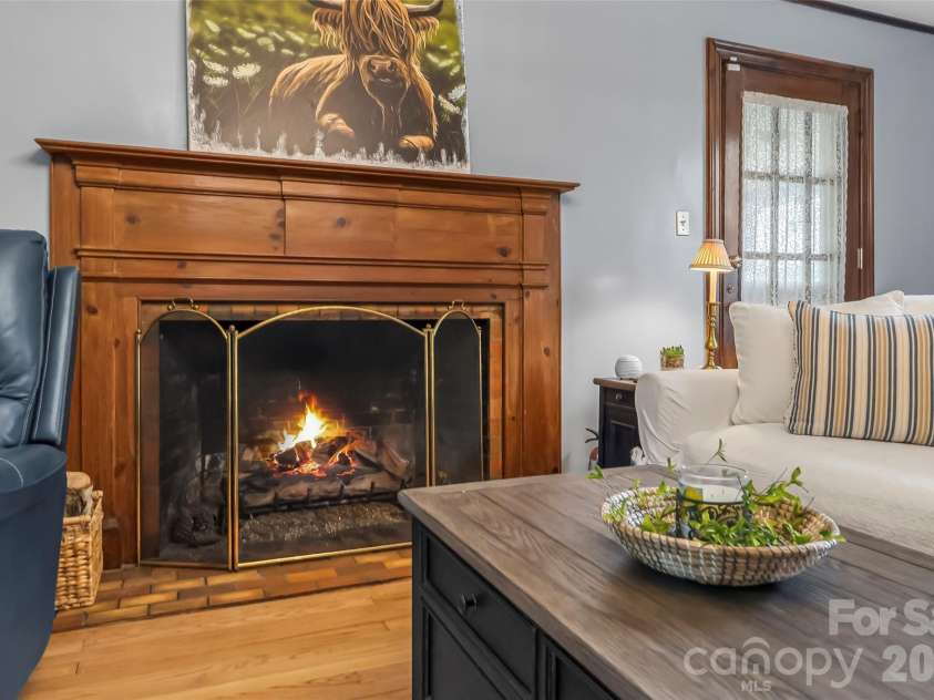 9 Crescent Drive, Marion, NC 28752.  MLS# CAR4370205, YatesRealty ID 19010. Cozy Gas log fireplace