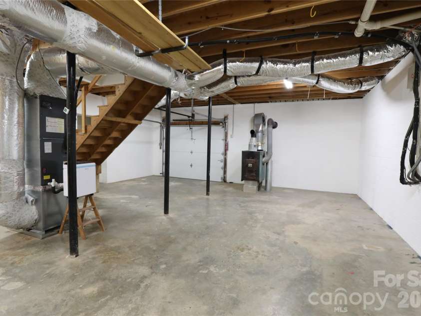 12809 Pine Bluff Road, Midland, NC 28107.  MLS# CAR4374117, YatesRealty ID 19012. Full basement