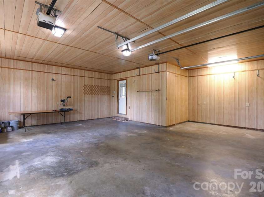 12809 Pine Bluff Road, Midland, NC 28107.  MLS# CAR4374117, YatesRealty ID 19012. Huge 2 car garage with additional workshop space.