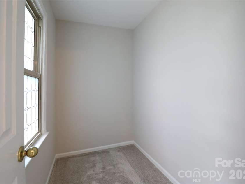 12809 Pine Bluff Road, Midland, NC 28107.  MLS# CAR4374117, YatesRealty ID 19012. Primary walk-in closet is ready for customizing to your needs.