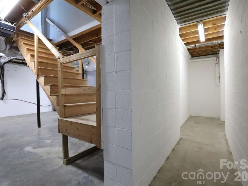 12809 Pine Bluff Road, Midland, NC 28107.  MLS# CAR4374117, YatesRealty ID 19012. Storage area off basement