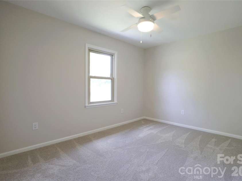 12809 Pine Bluff Road, Midland, NC 28107.  MLS# CAR4374117, YatesRealty ID 19012. Third Bedroom