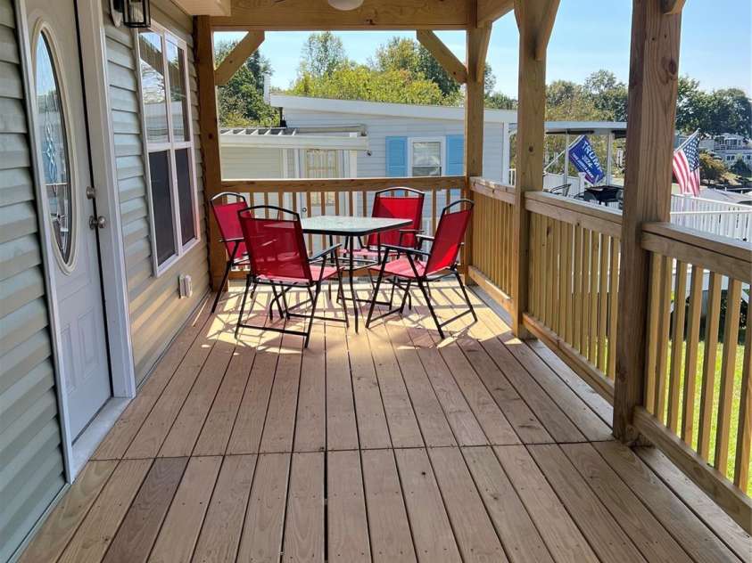 102 Elm Street, New London, NC 28127.  MLS# CAR4189794, YatesRealty ID 1902. Covered front porch. 24x8