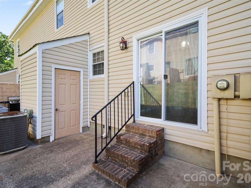 973 Surry Lane, Gastonia, NC 28054.  MLS# CAR4377740, YatesRealty ID 19027. Back patio