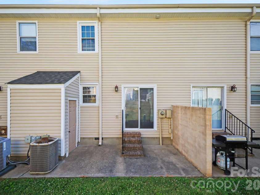 973 Surry Lane, Gastonia, NC 28054.  MLS# CAR4377740, YatesRealty ID 19027. Back patio