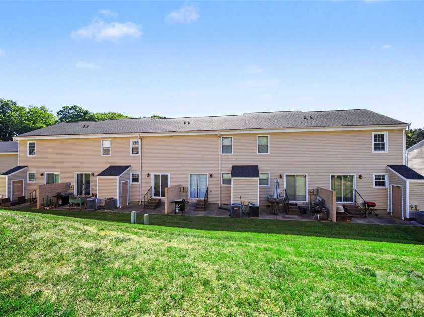 973 Surry Lane, Gastonia, NC 28054.  MLS# CAR4377740, YatesRealty ID 19027. Backyard lawn