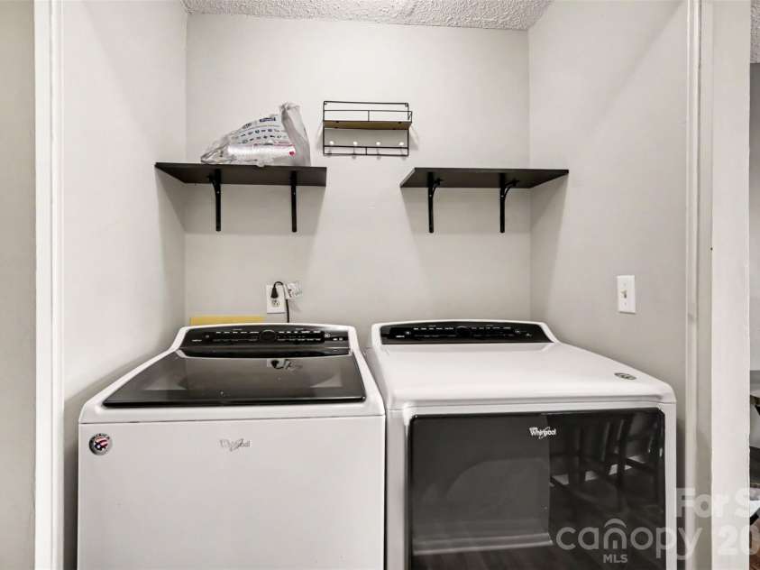 973 Surry Lane, Gastonia, NC 28054.  MLS# CAR4377740, YatesRealty ID 19027. Laundry area