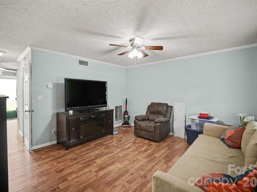 973 Surry Lane, Gastonia, NC 28054.  MLS# CAR4377740, YatesRealty ID 19027. Living room