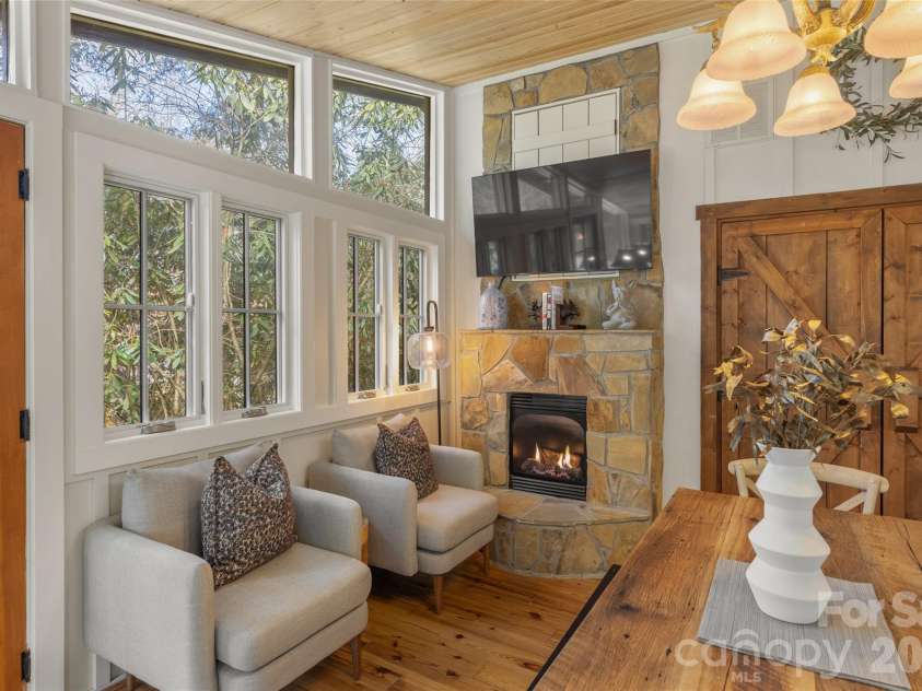 464 Franklin Road, Highlands, NC 28741.  MLS# CAR4346865, YatesRealty ID 1903. Den fireplace