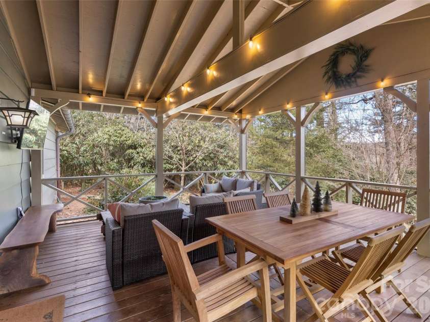 464 Franklin Road, Highlands, NC 28741.  MLS# CAR4346865, YatesRealty ID 1903. Dining table: screened porch