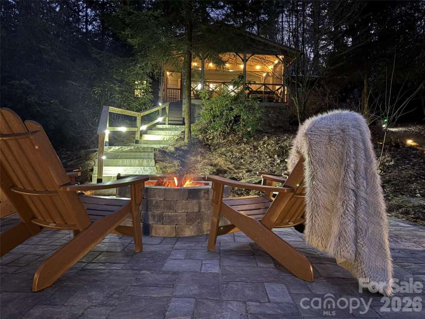 464 Franklin Road, Highlands, NC 28741.  MLS# CAR4346865, YatesRealty ID 1903. Lighted stone stairs to firepit