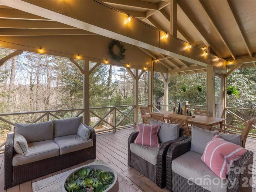 464 Franklin Road, Highlands, NC 28741.  MLS# CAR4346865, YatesRealty ID 1903. Screened porch