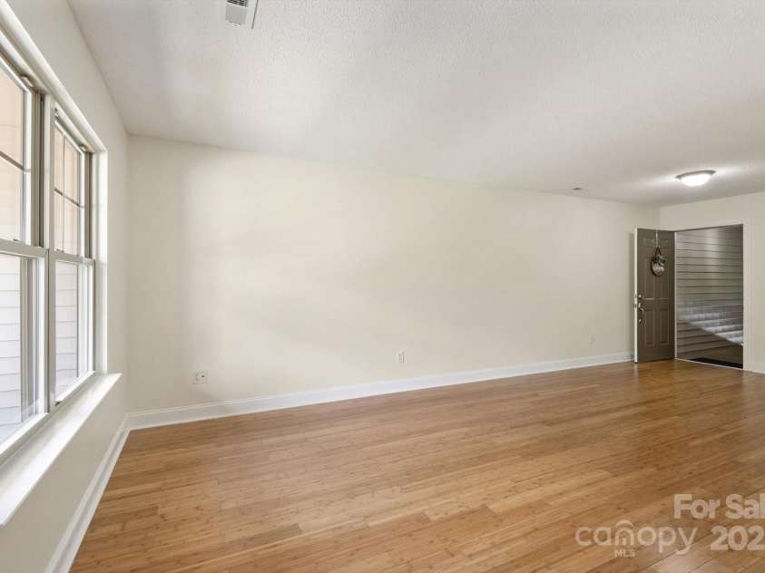 252 Unit F Wash Creek Drive, Hendersonville, NC 28739.  MLS# CAR4243596, YatesRealty ID 19031. 