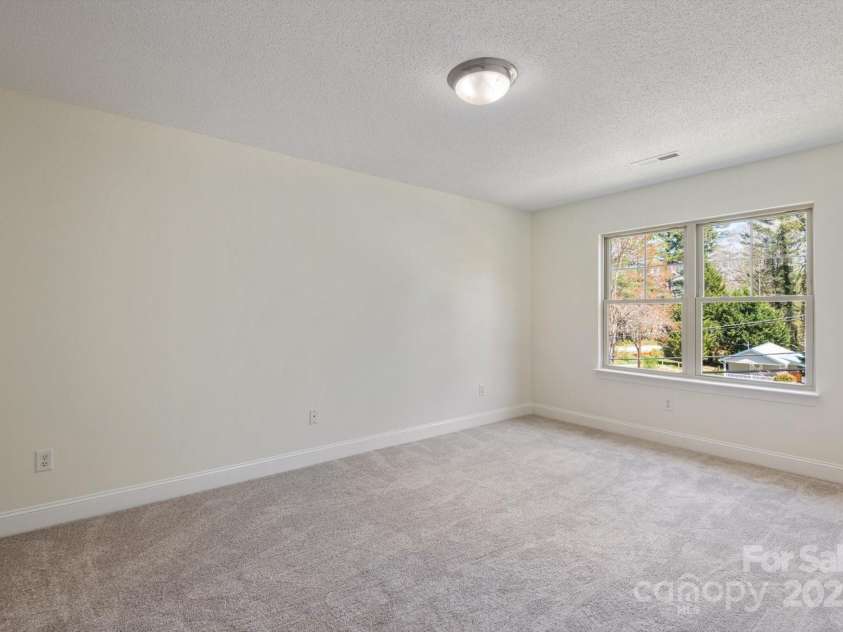 252 Unit F Wash Creek Drive, Hendersonville, NC 28739.  MLS# CAR4243596, YatesRealty ID 19031. 