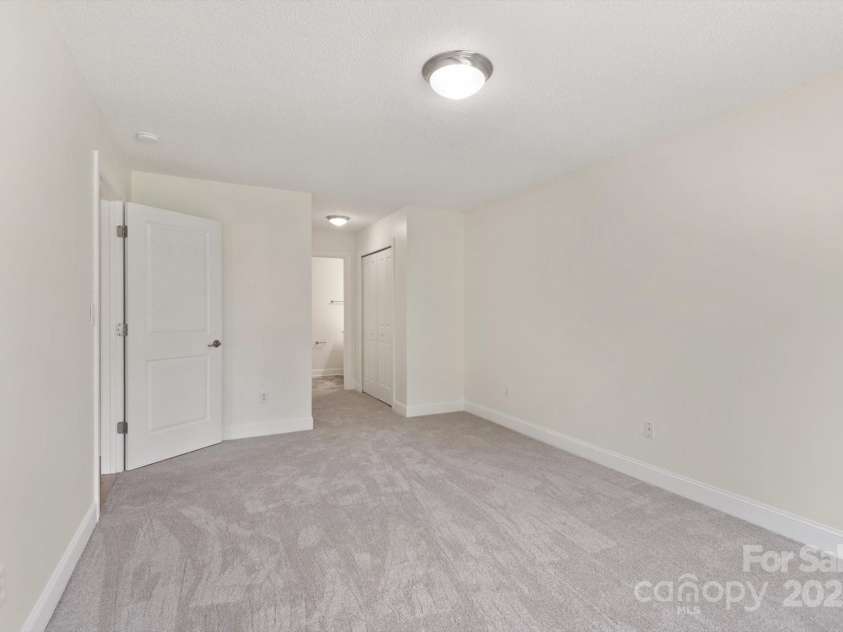 252 Unit F Wash Creek Drive, Hendersonville, NC 28739.  MLS# CAR4243596, YatesRealty ID 19031. 