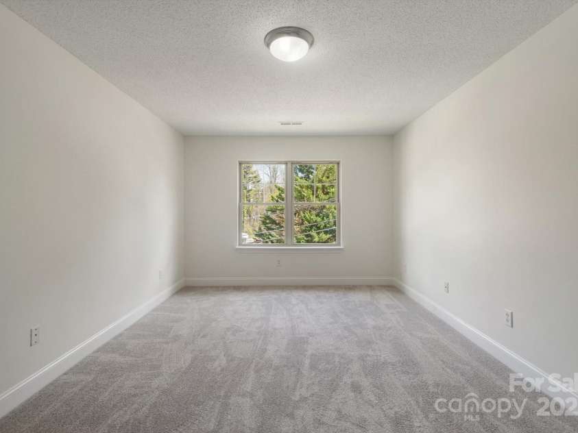 252 Unit F Wash Creek Drive, Hendersonville, NC 28739.  MLS# CAR4243596, YatesRealty ID 19031. 