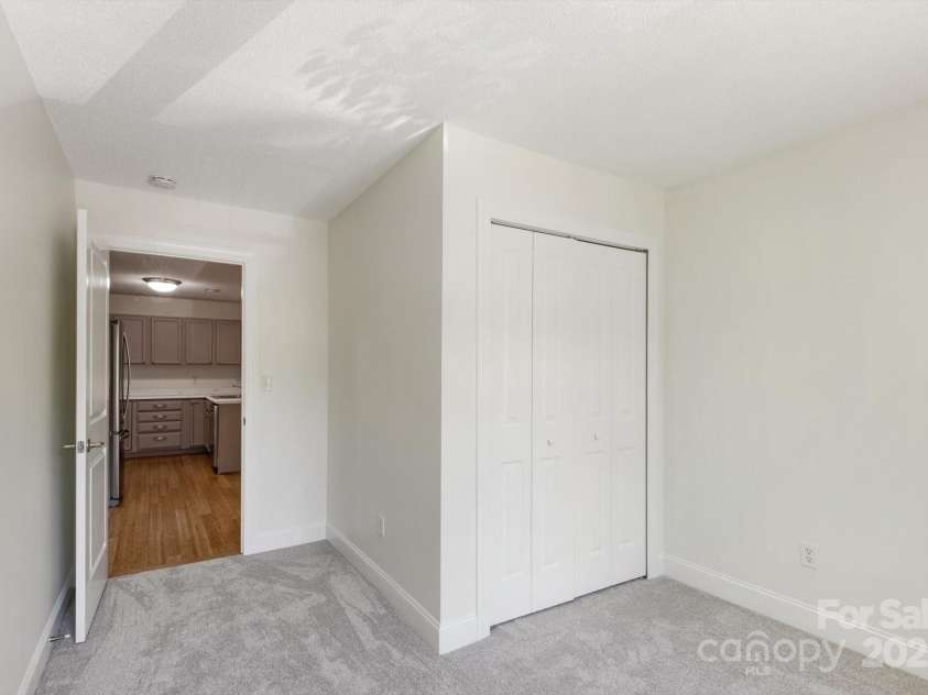 252 Unit F Wash Creek Drive, Hendersonville, NC 28739.  MLS# CAR4243596, YatesRealty ID 19031. 