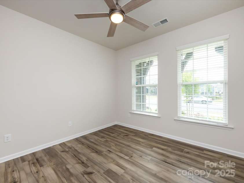 3199 Windhaven Lane, Tega Cay, SC 29708.  MLS# CAR4250667, YatesRealty ID 19032. Guest Bedroom on Main Floor