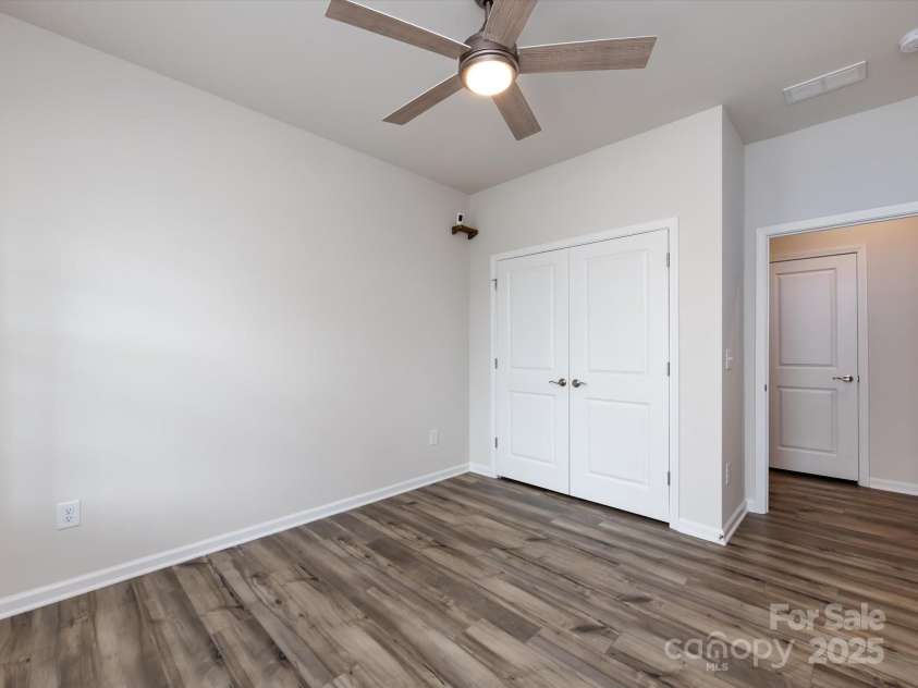 3199 Windhaven Lane, Tega Cay, SC 29708.  MLS# CAR4250667, YatesRealty ID 19032. Guest Bedroom on Main Floor