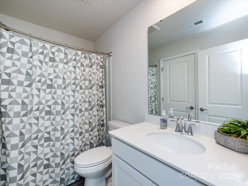 3199 Windhaven Lane, Tega Cay, SC 29708.  MLS# CAR4250667, YatesRealty ID 19032. Upstairs Guest Bathroom