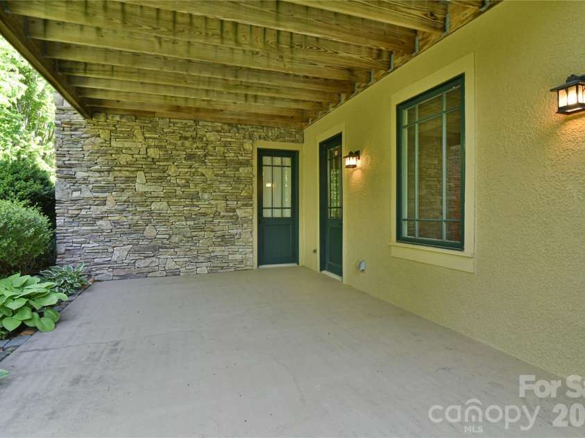 52 Mandolin Drive, Black Mountain, NC 28711.  MLS# CAR4377547, YatesRealty ID 19033. Both Bedrooms Open onto Patio