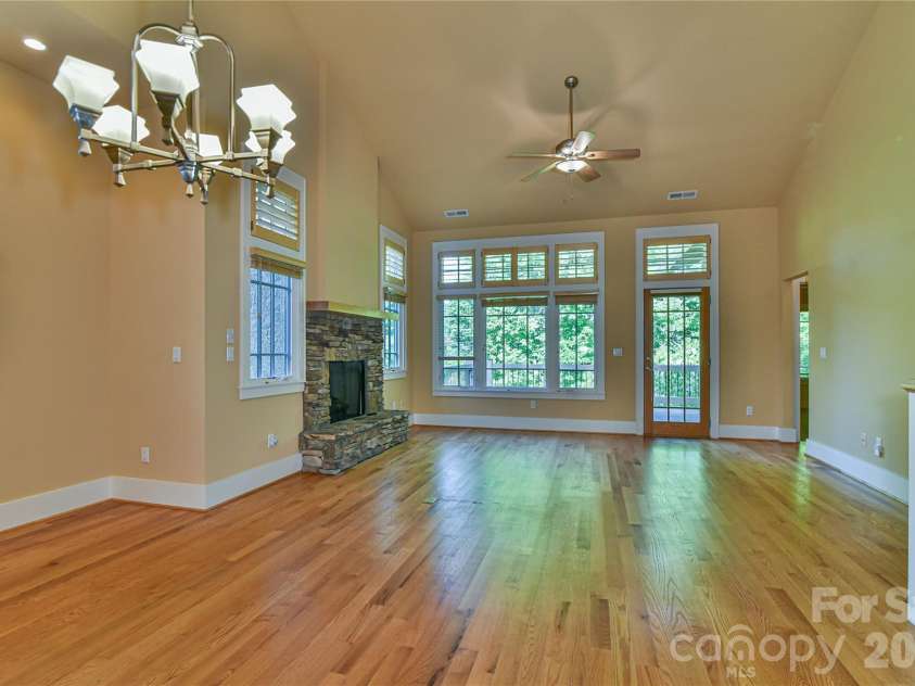 52 Mandolin Drive, Black Mountain, NC 28711.  MLS# CAR4377547, YatesRealty ID 19033. Gleaming Wood Floors Reflect the Plentiful Sunlight